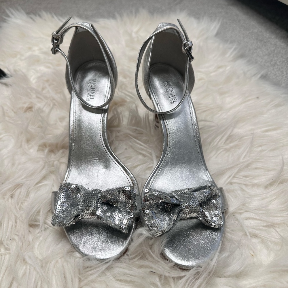 Micheal Kors Sylva sandals with buckle detail and size 8M.